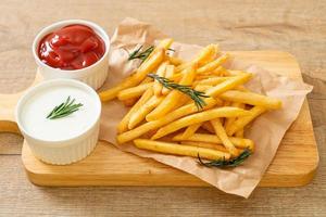 french-fries-with-sour-cream-and-ketchup-free-photo